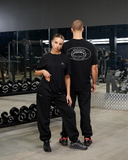 REALISM X DERRIMUT GYM OLD SCHOOL TEE BLACK